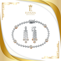 Jewelry set with bracelet and earrings on a white background with Elyazia logo.